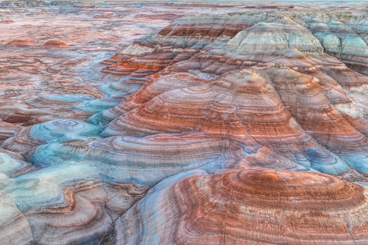Colorful layered bentonite clay rock formations in a  Utah desert landscape