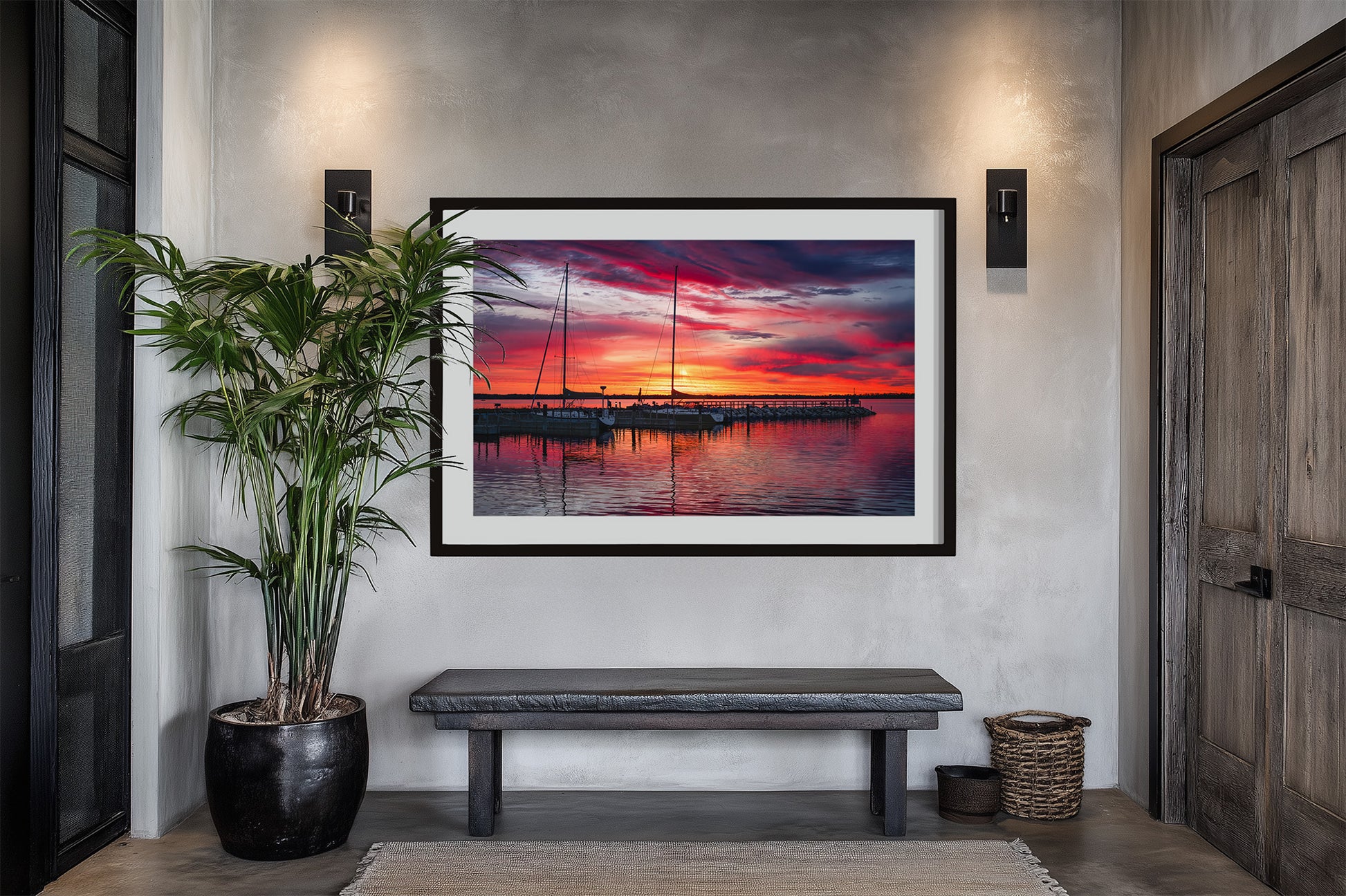 Northport Marina on Grand Traverse Bay with sailboats at sunrise under a vibrant red, orange and blue sky. Framed in entryway.